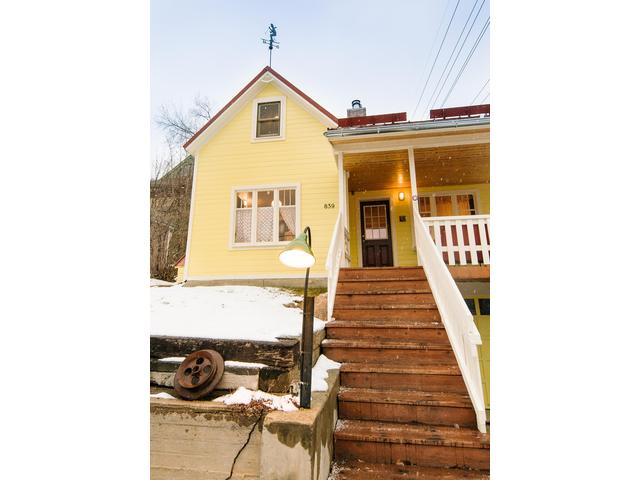 There are two parking spots - one on the driveway and one on the street in front of the house, requiring a permit