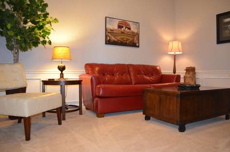Sitting room with Wii console, flat screen TV, DVD player and games