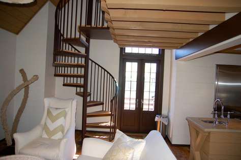 Spiral Staircase leads to Loft and King Bedroom