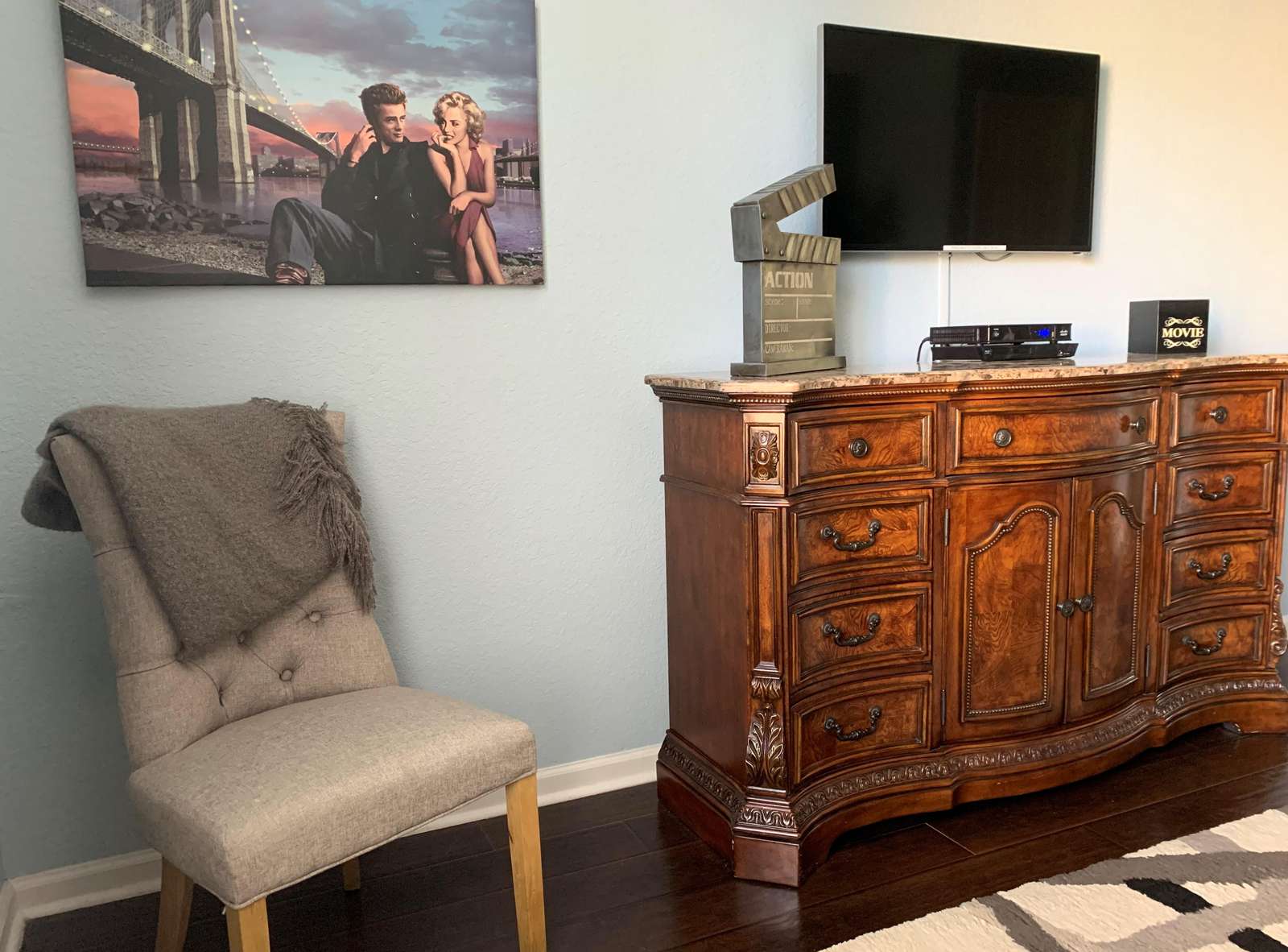 Flatscreen TV and DVD player in master bedroom