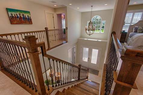 Grand entry leads to upstairs 