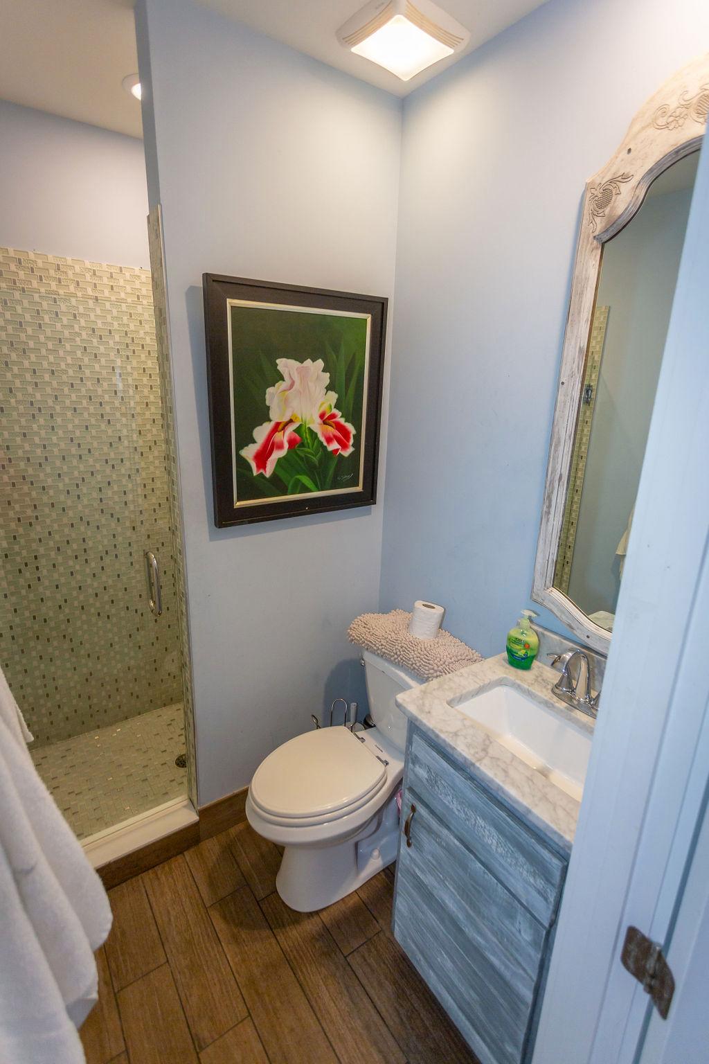 Bathroom # 6 has large white marble shower