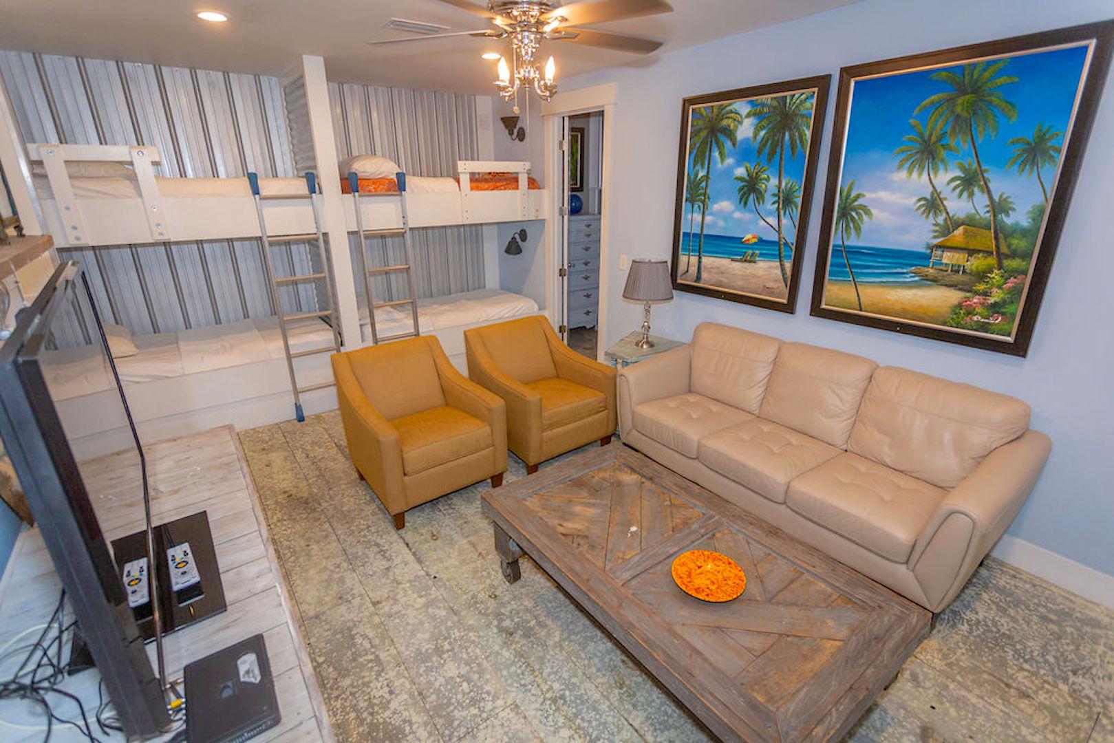 family room, sofa, 2 chairs, 3 sets of bunks-sleeps 6, flat screen