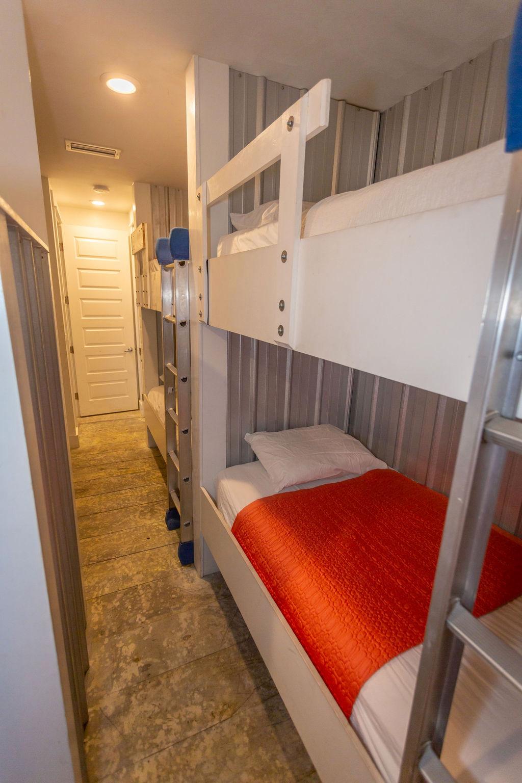 br # 3 has 3 sets of bunks/bath/private exit