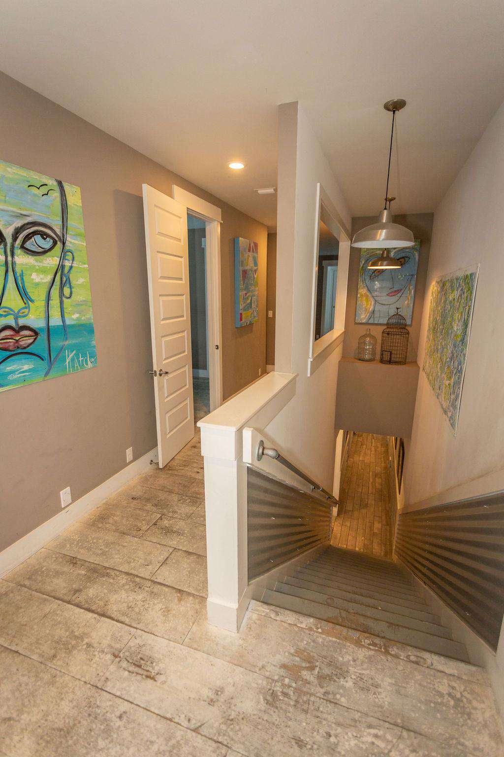 Hall way leading to upstairs family room