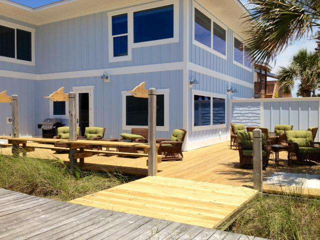 large deck with comfy tall chairs, rockers, gate opens in the middle if you rent both sides