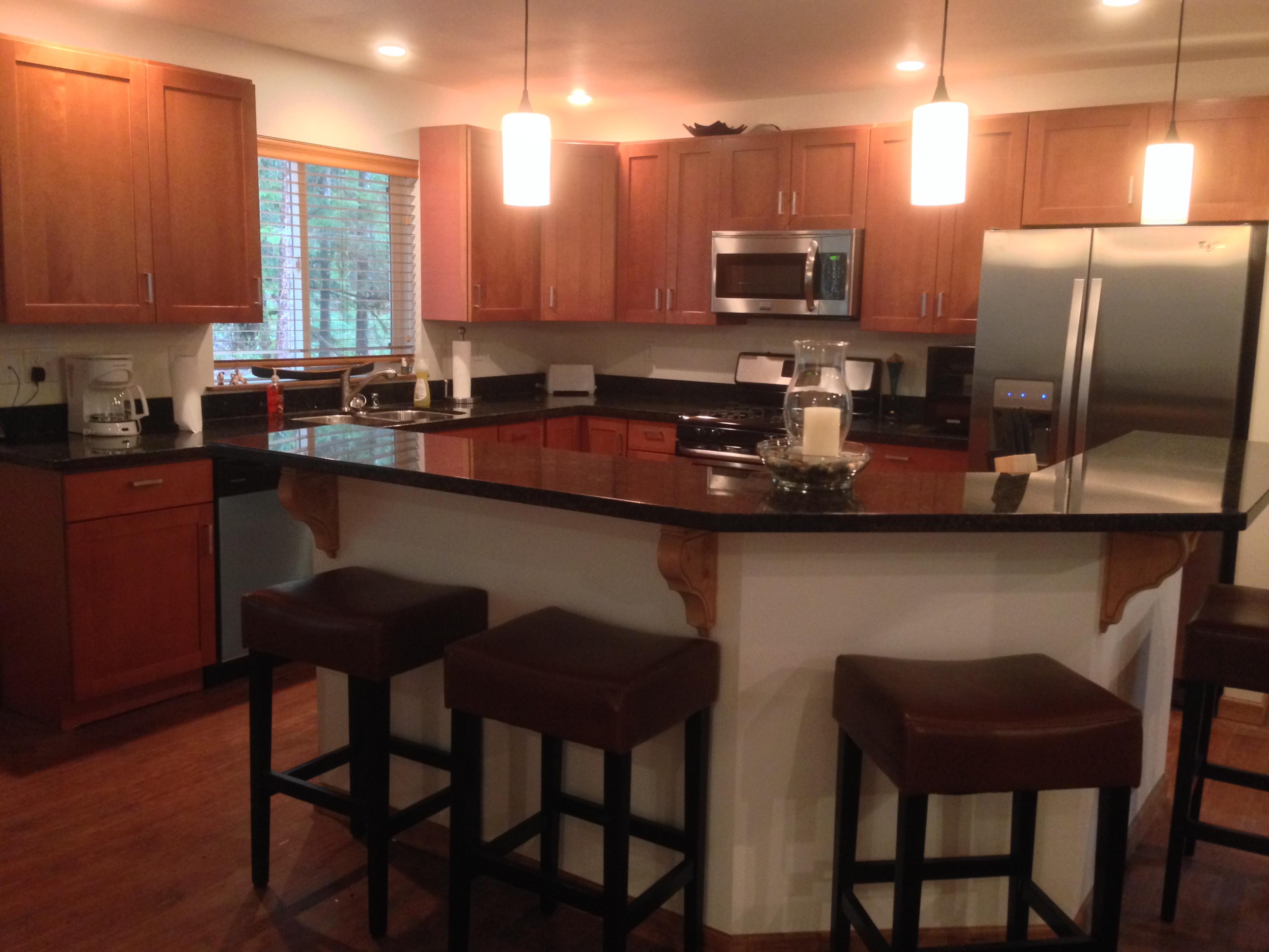 Granite Bar with seating for 4 (Huge Live Edge Dining Room table not shown)