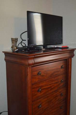 Flat screen TV and Blu-ray DVD player in third bedroom