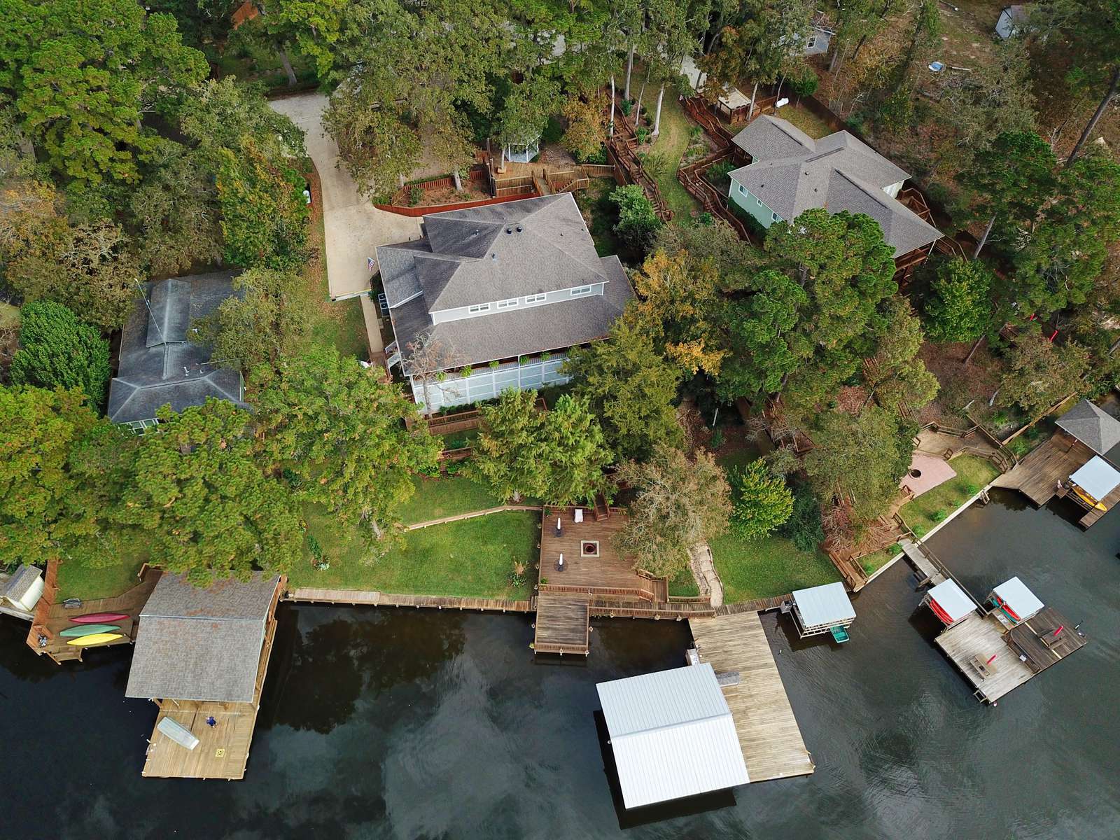 The Large house in the middle is Lakeside, To the right is Pats Place. Many people rent multiple homes for larger groups or events.