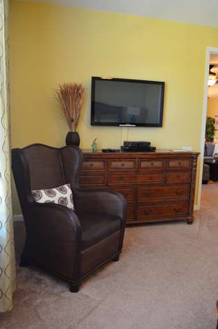 Sitting area in master with flatscreen TV and DVD player