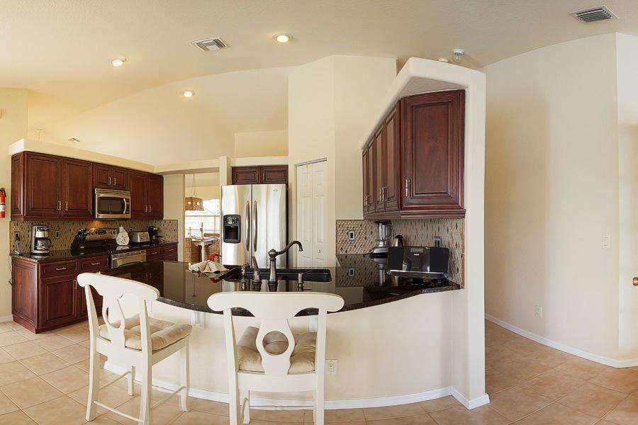 Wischis Florida Home - Vacation Homes Cape Coral - Property Management Cape Coral - Real Estate