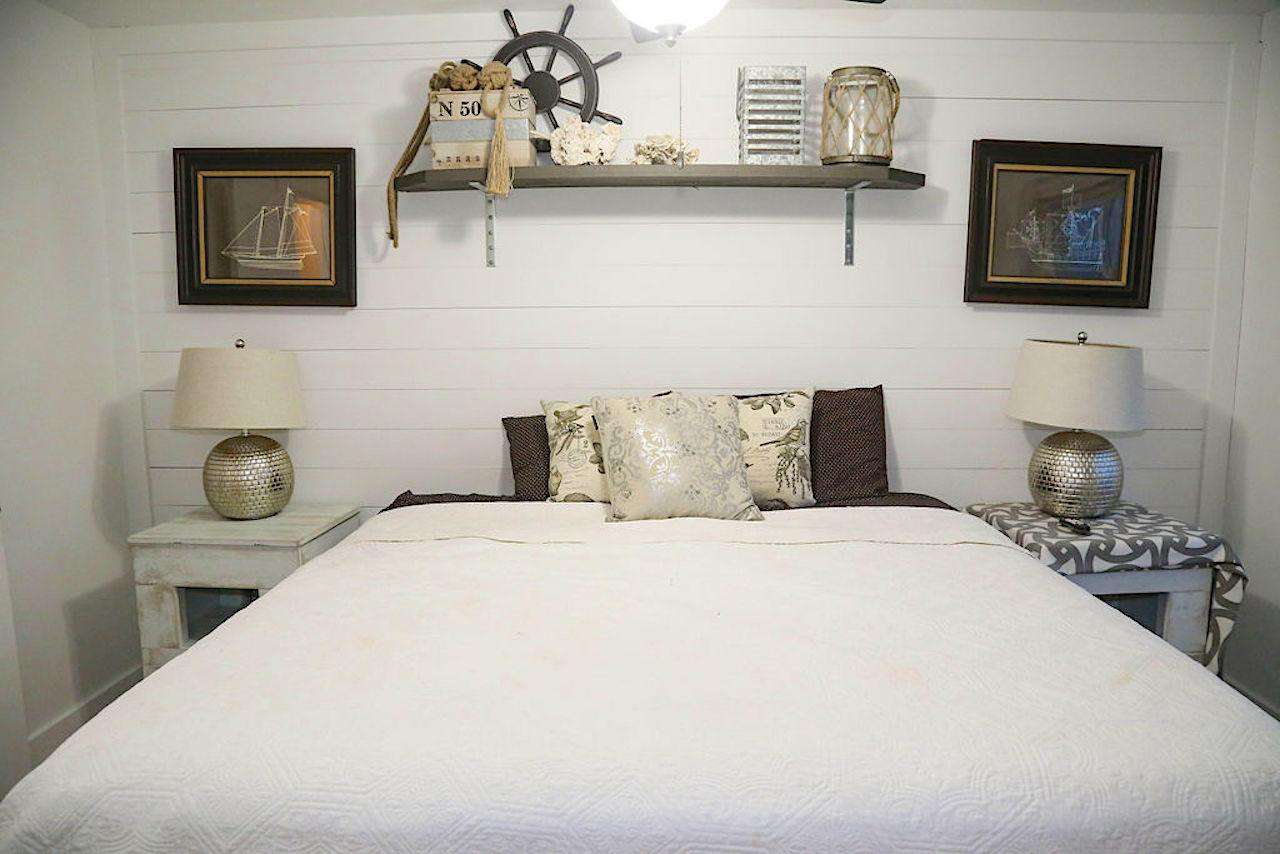 bedroom # 5 king bed with bath, flat screen and ocean view