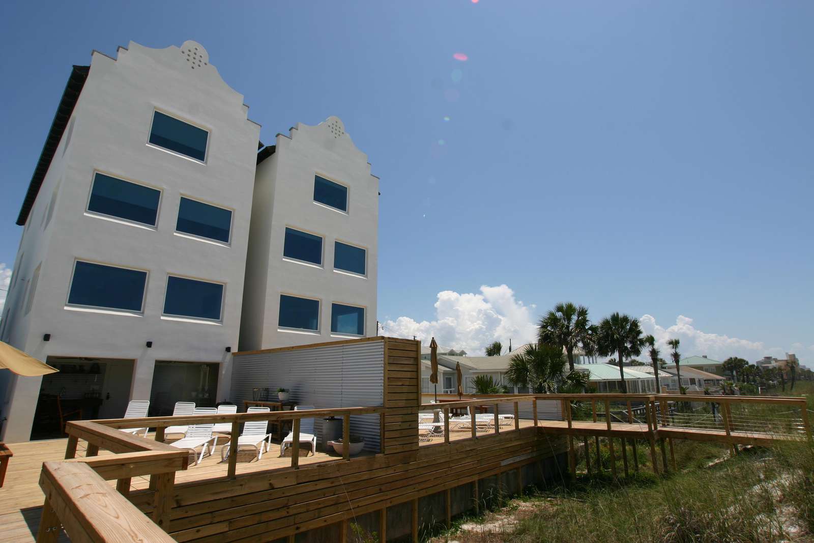 view of the Quiet Lady & Opulent Pearl deck & walkover & PRIVACY WALL BETWEEN HOMES