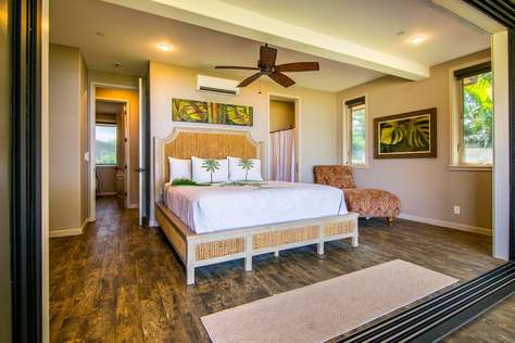 Sliding walls open the Master Bedroom to the view