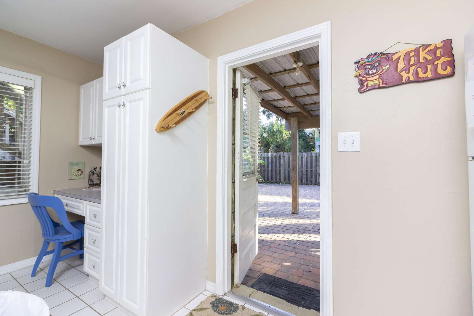 Desk / Back Door leading to spacious Backyard!