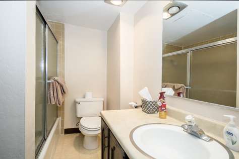 Your bathroom with vanity, shower/tub and toilet.