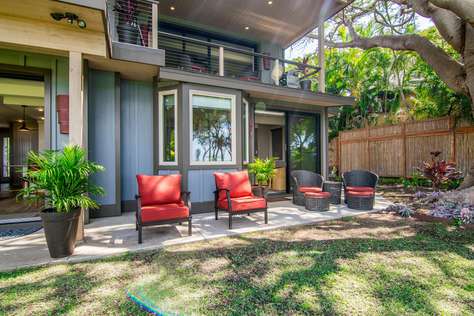 Studio has the entire corner and side yard.