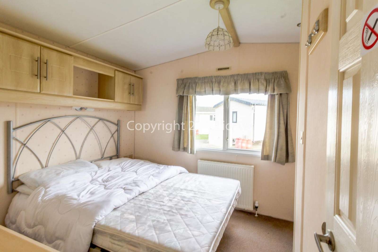 You can find plenty of storage in this master bedroom!