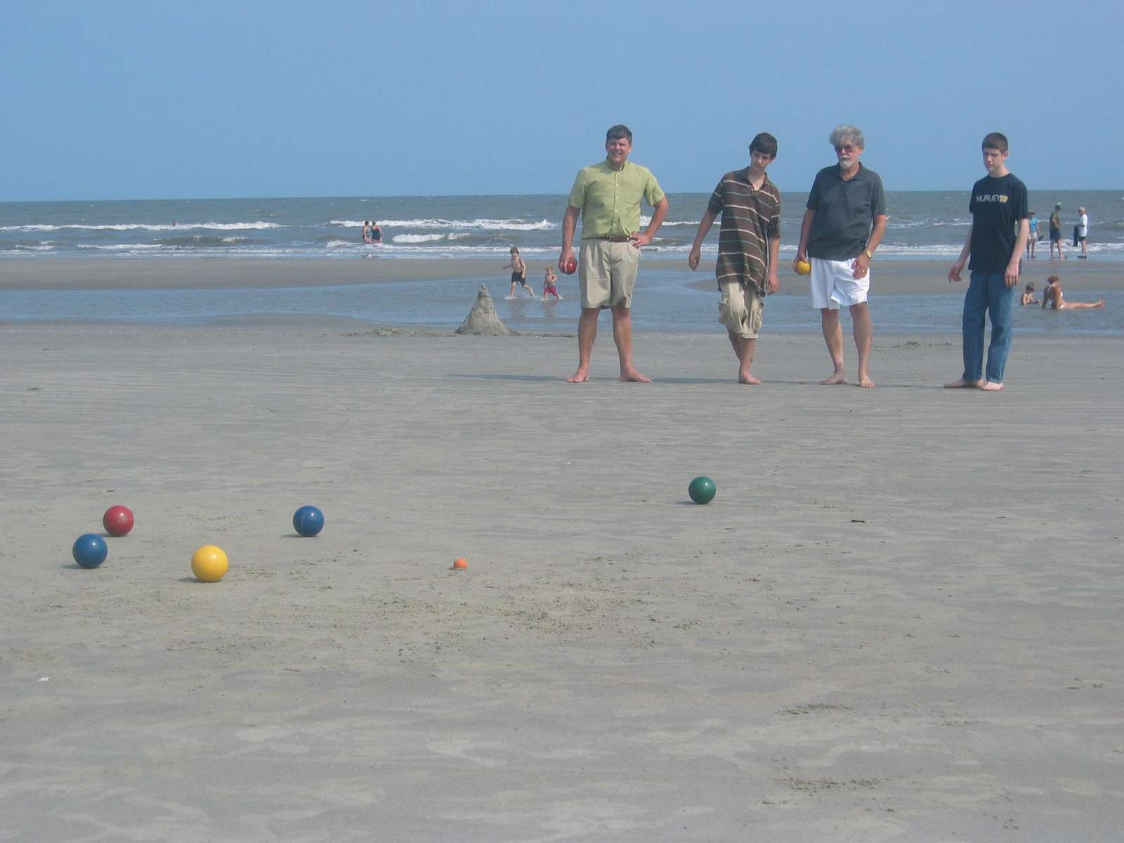 Playing Bocci Ball on the Beach