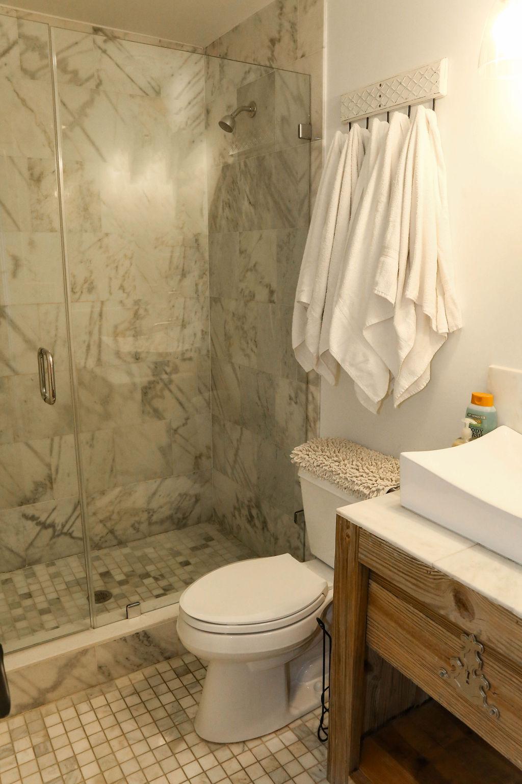 br #4 bath, marble shower with glass door