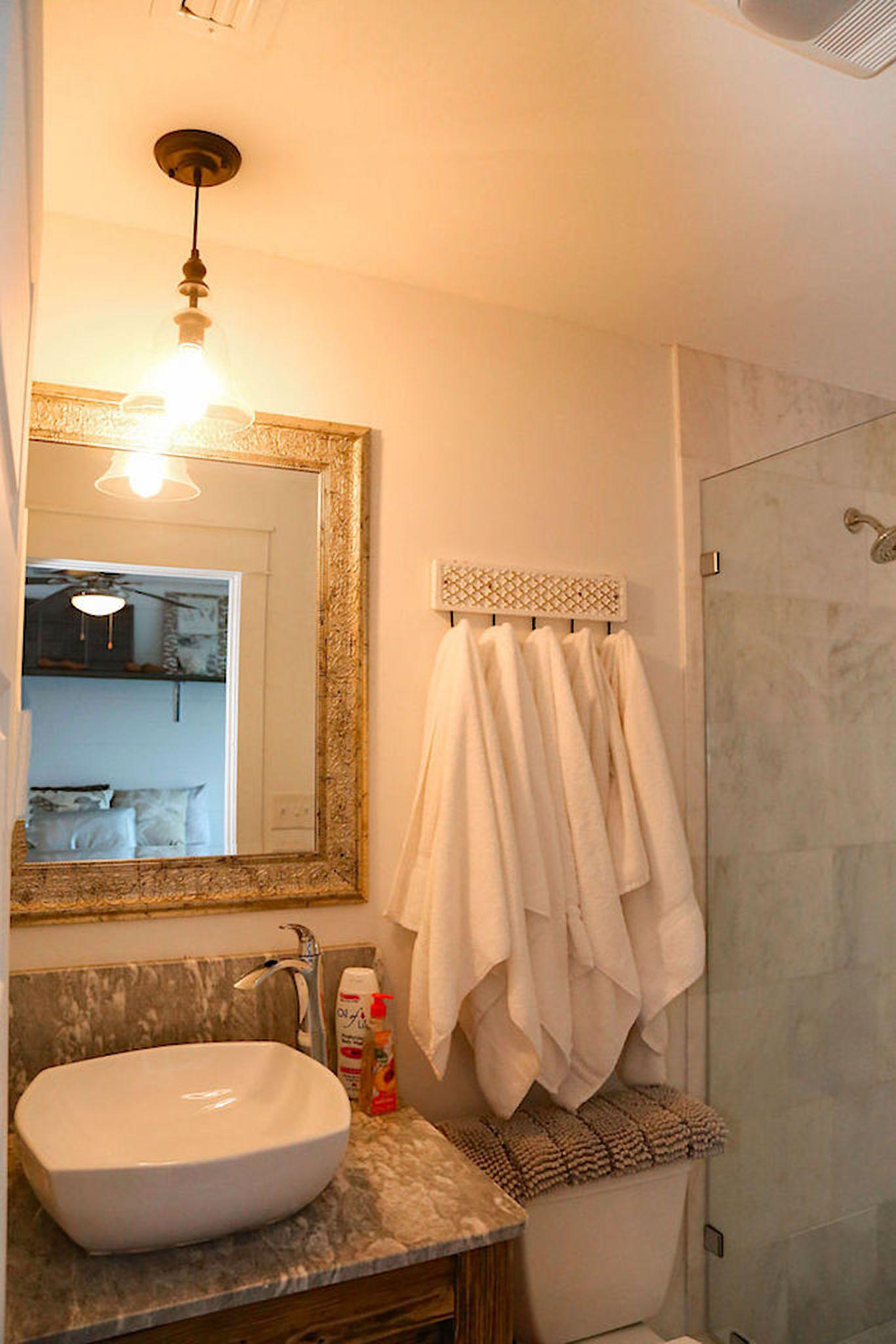 Bathroom # 2 has custom white marble shower