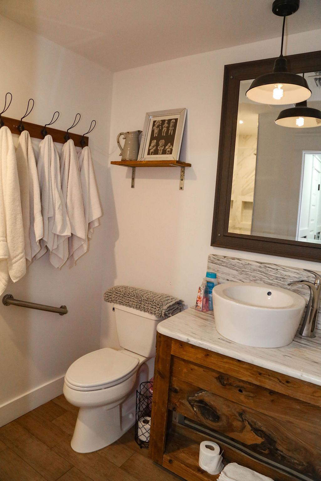 Bathroom #5 has custom white marble shower