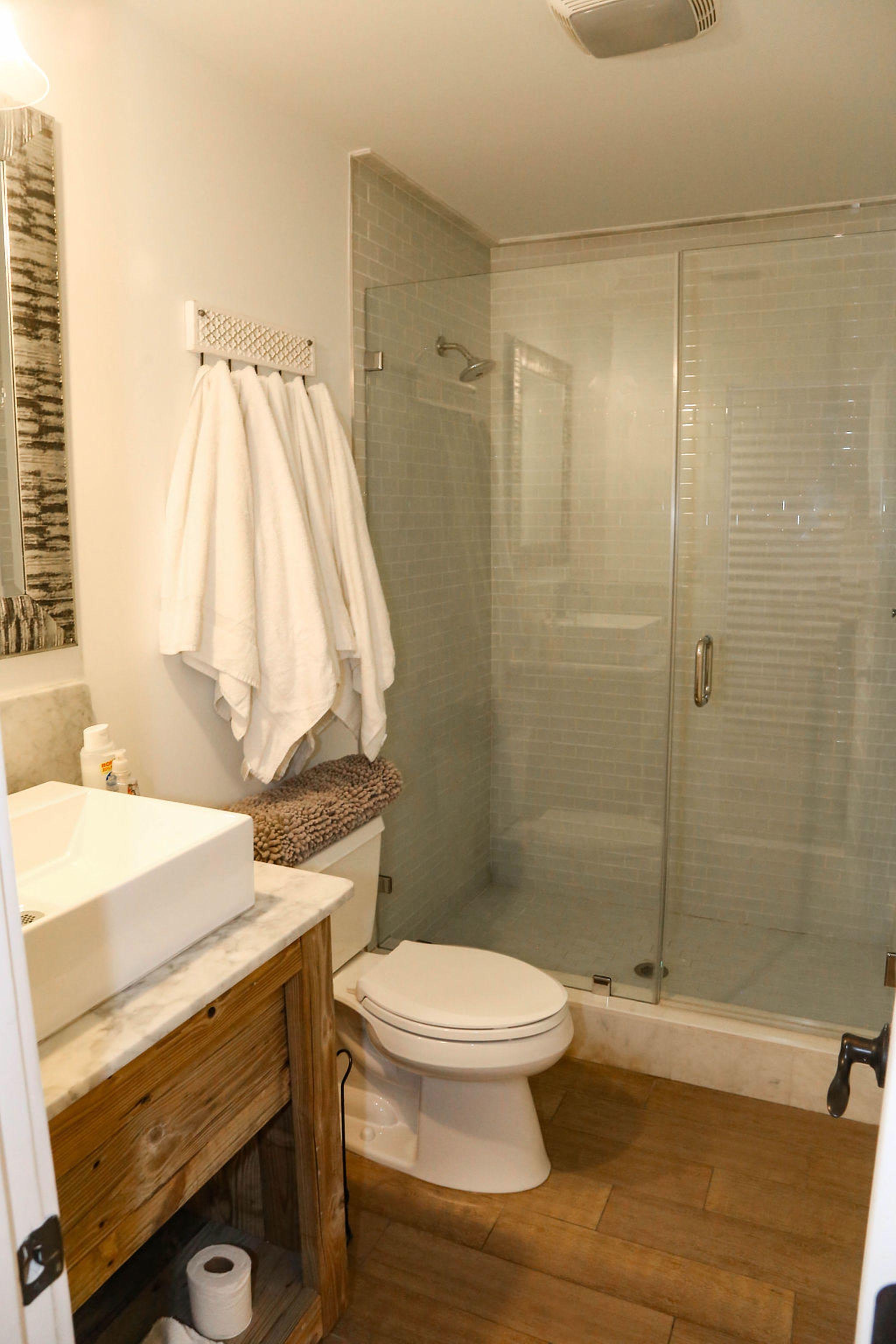 Bathroom # 8 large white marble shower with glass door