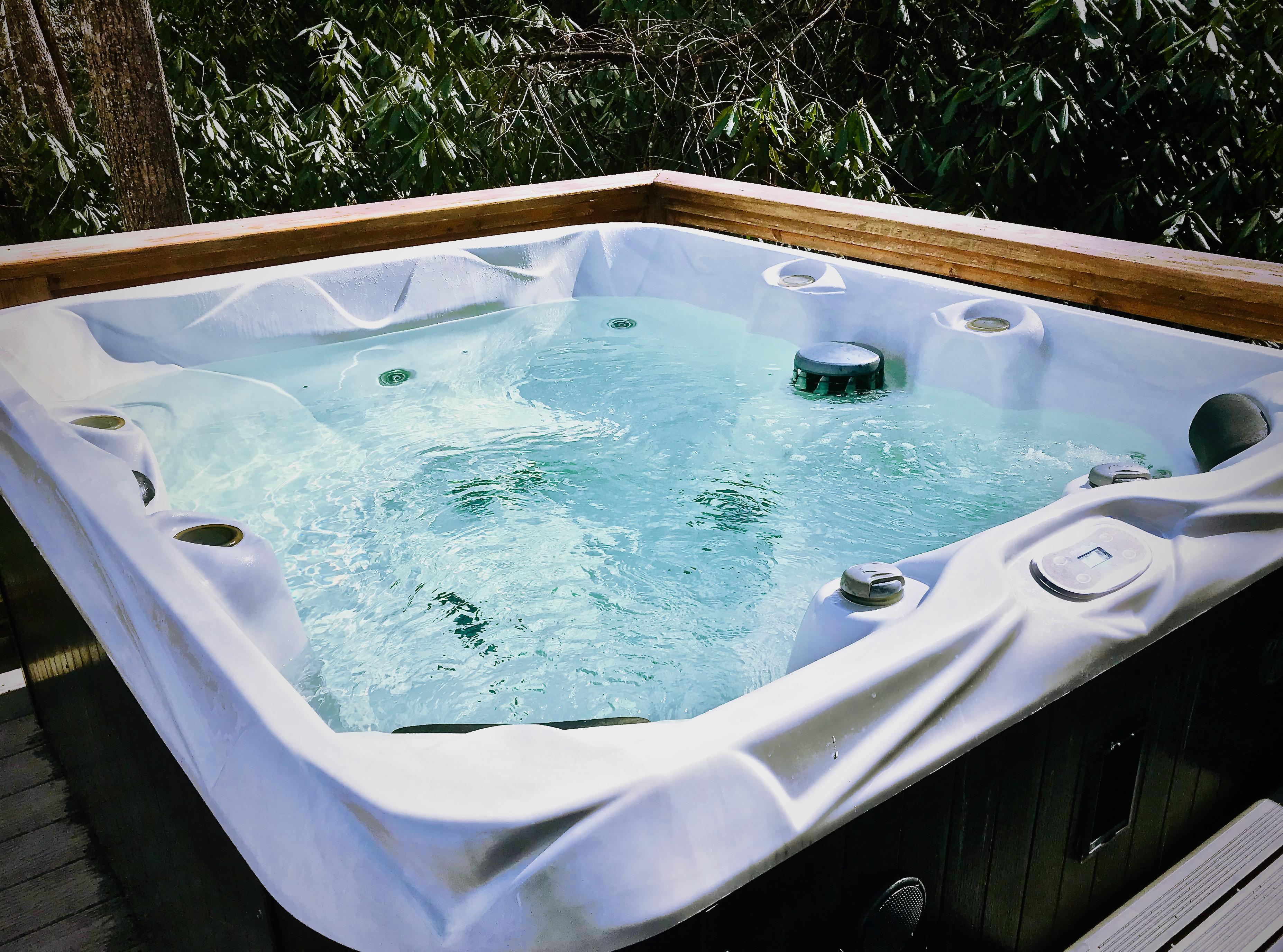 Soothing and Sparkling Hot Tub awaits...