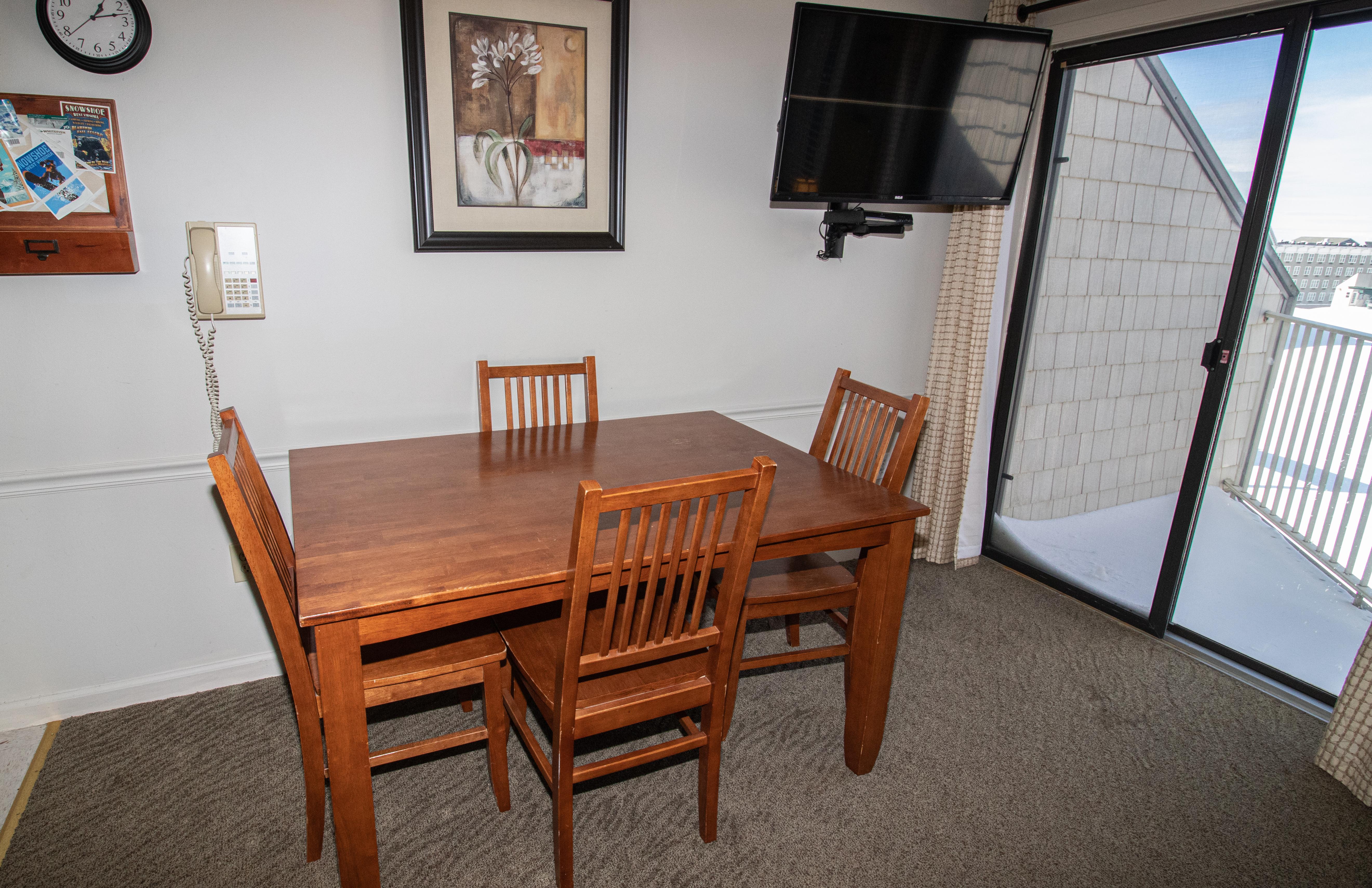 Dining area seats four (4) comfortably
