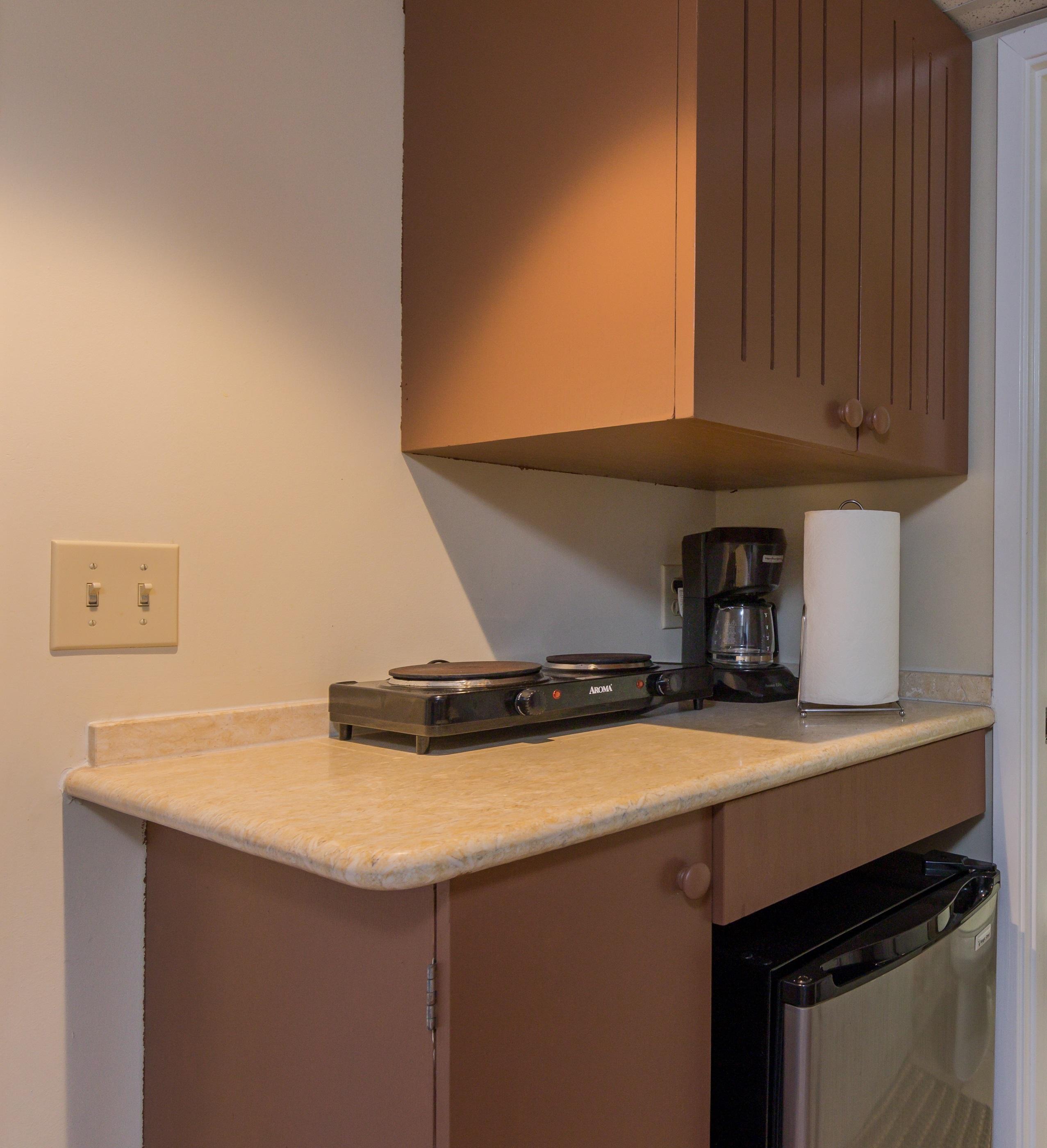 In-Room Conveniences mini fridge, coffee maker and electric burners