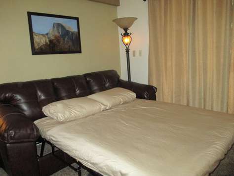 Your queen size sofa sleeper converts into a bed.