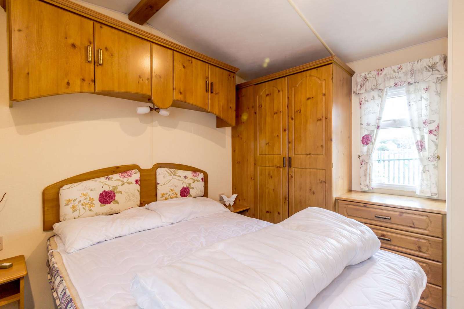 You can find plenty of storage in this master bedroom