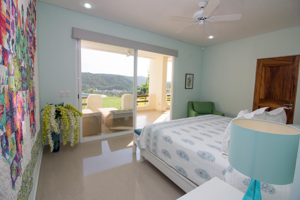 Master bedroom with king bed and step out to the loungers
