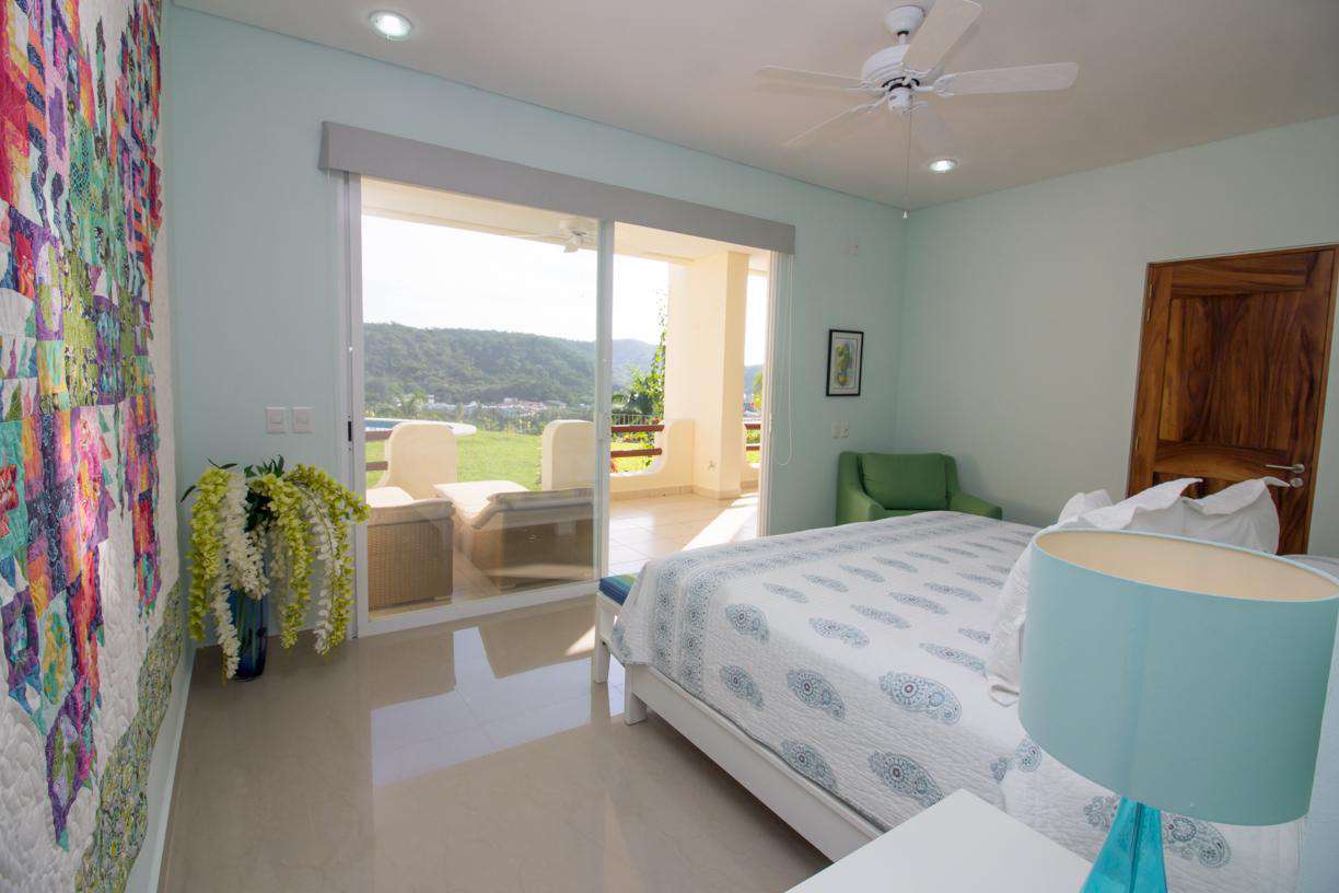 Master bedroom with king bed and step out to the loungers