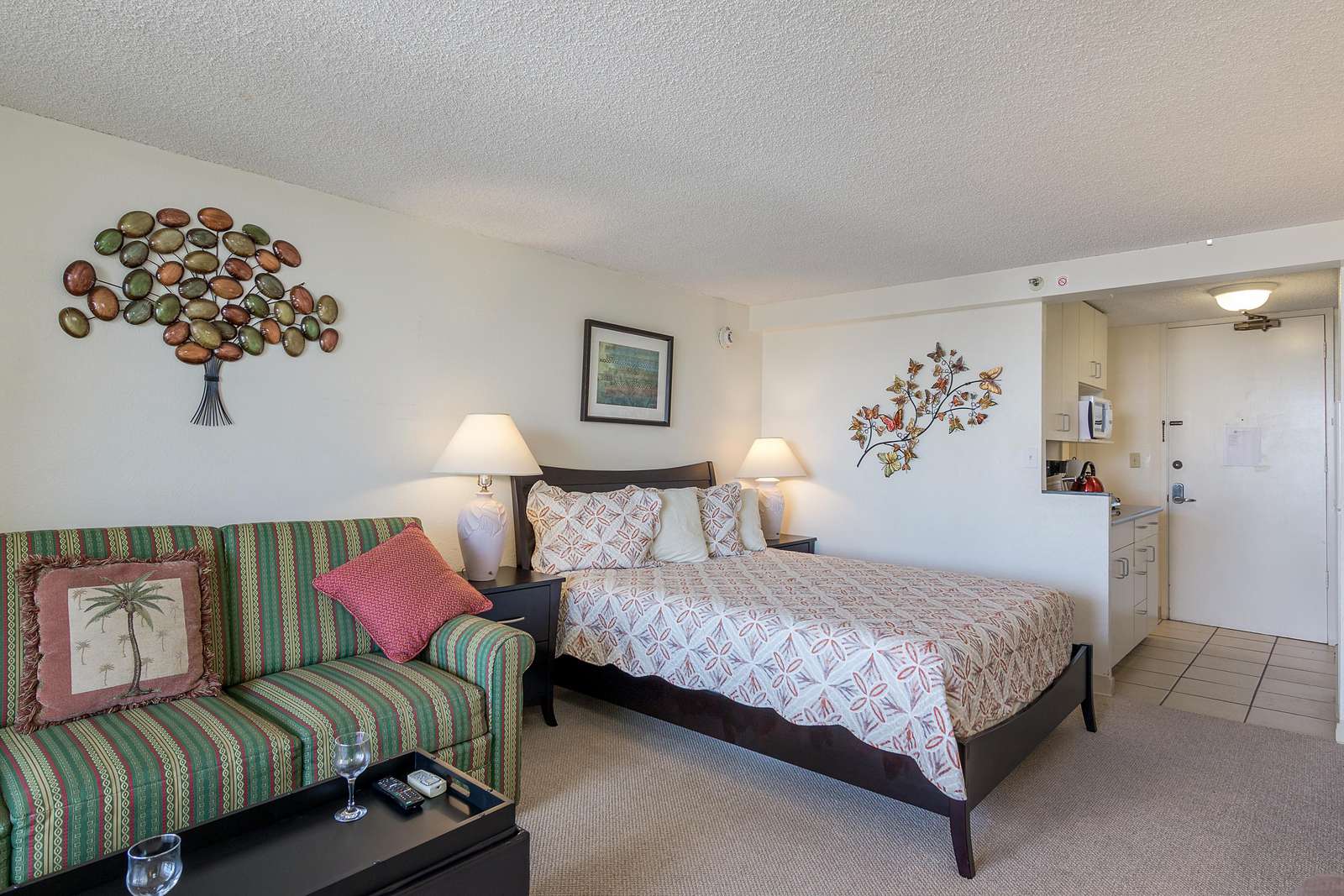 View of Queen Size Bed and Kitchenette