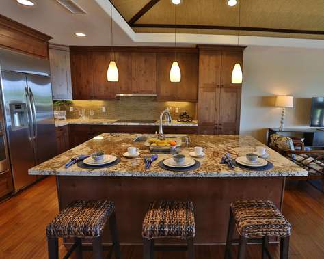 Island bar seating and gourmet kitchen