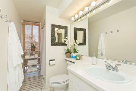 Bright and airy bathroom complete with Robes & Towels