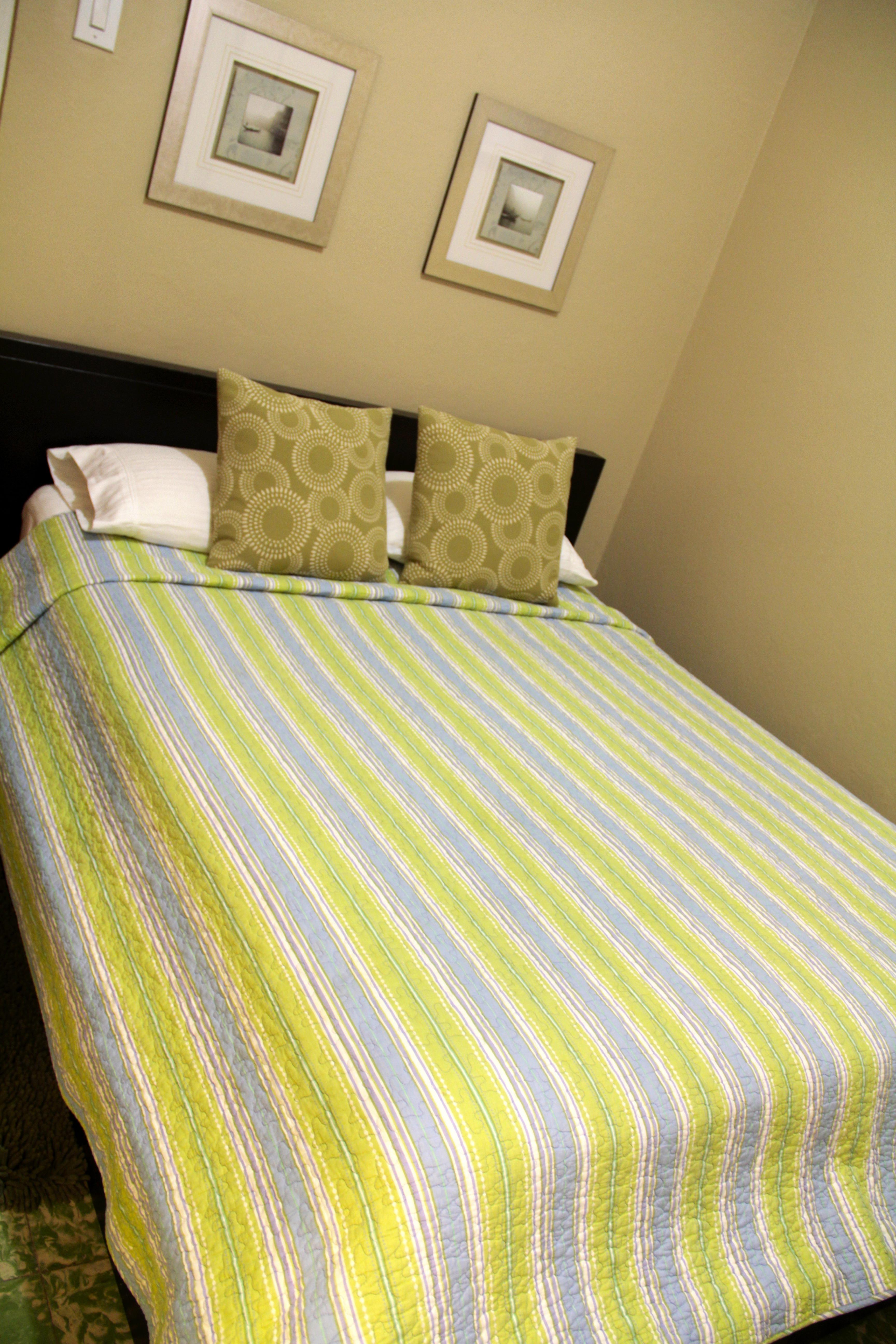 2nd bedroom with queen bed and in suite bathroom
