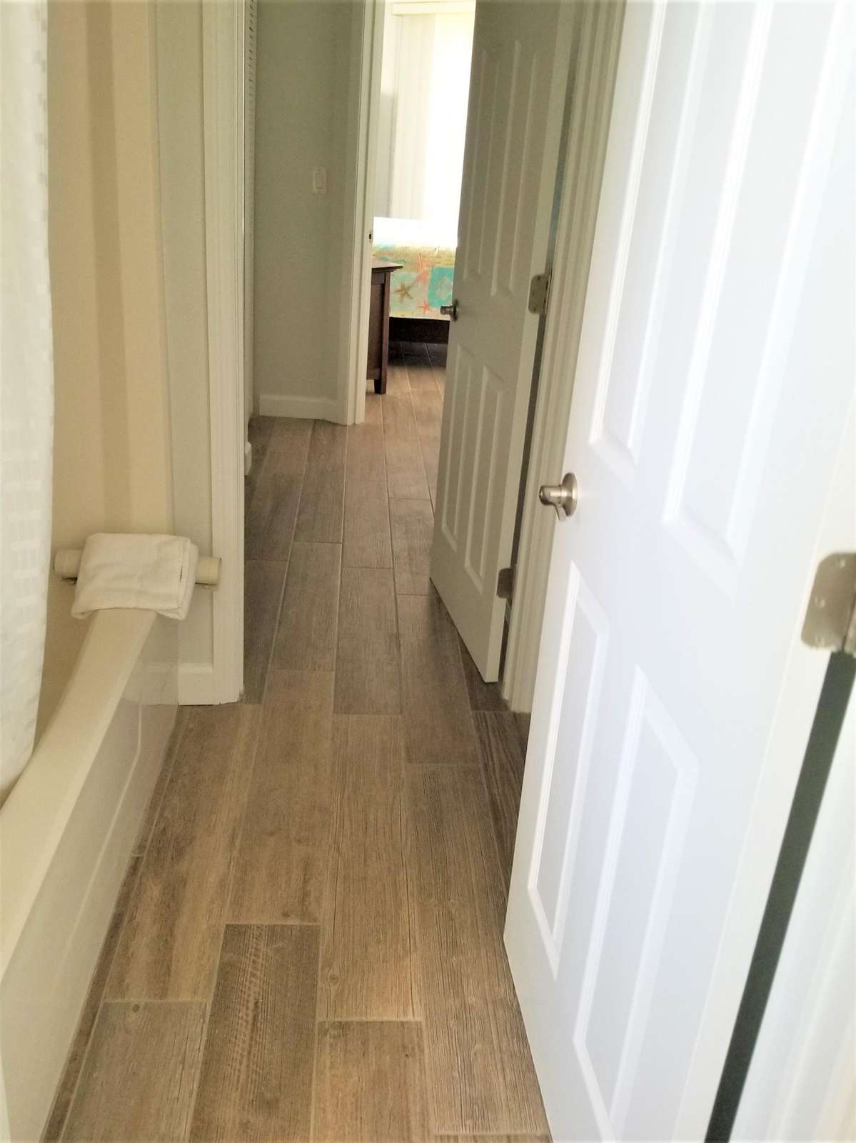Hallway thru bathrooms