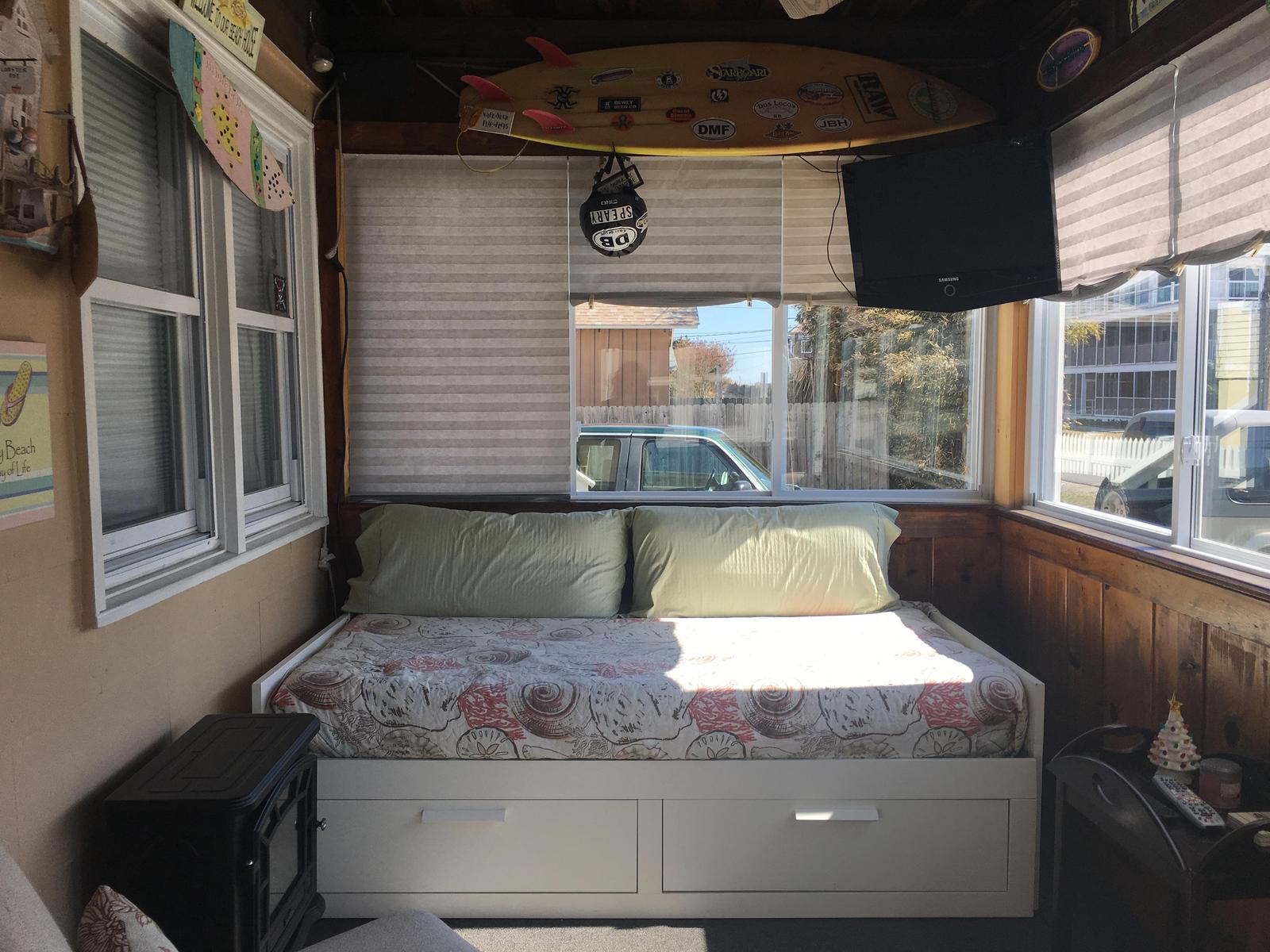 Front sunroom with daybed for lounging or sleeping