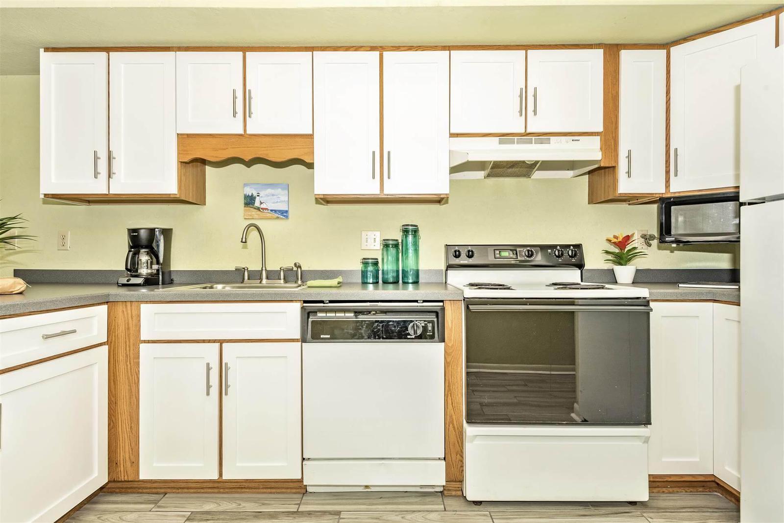 Lots of cabinets for storage!