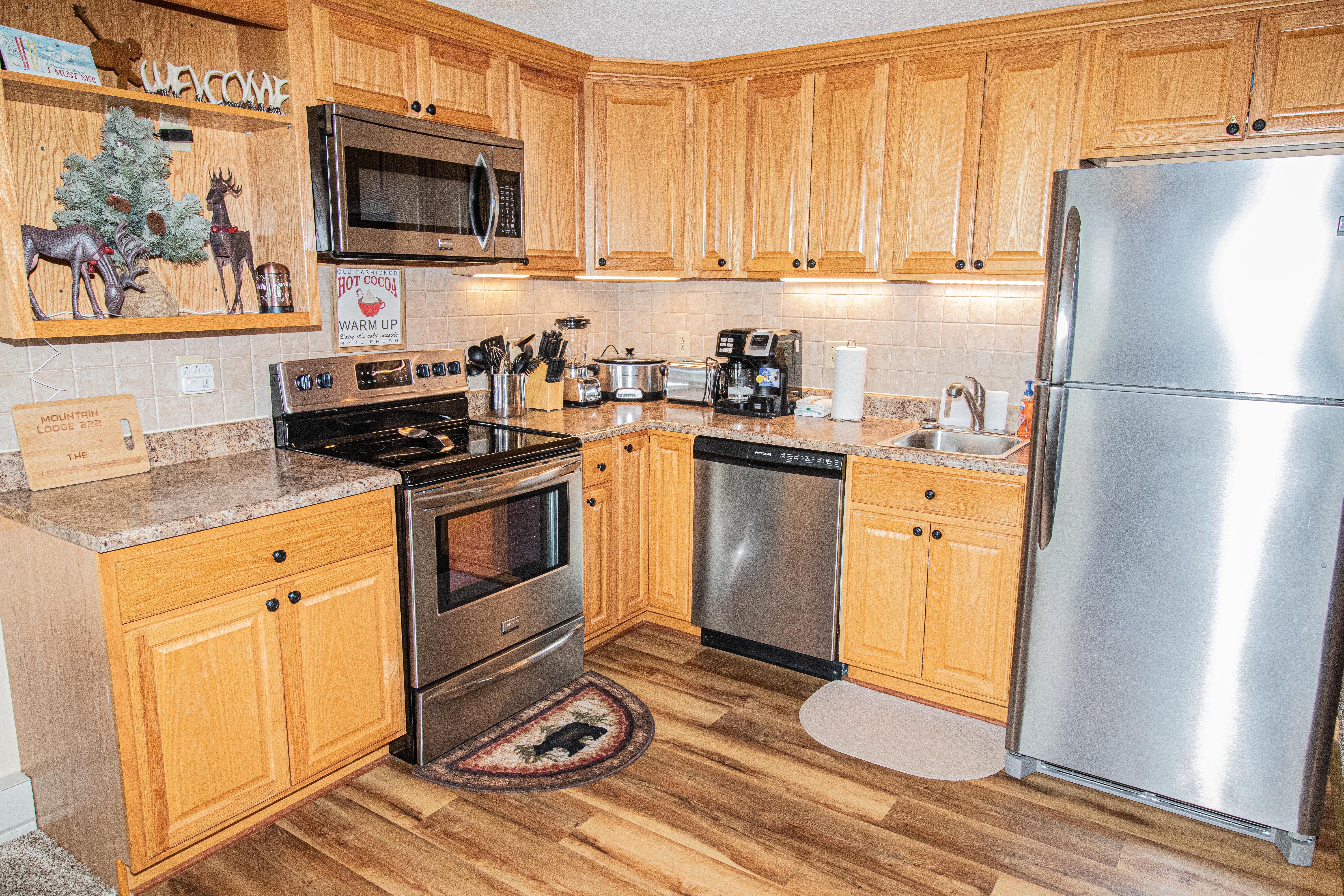 Remodeled kitchen is fully equipped - cook meals in your condo!