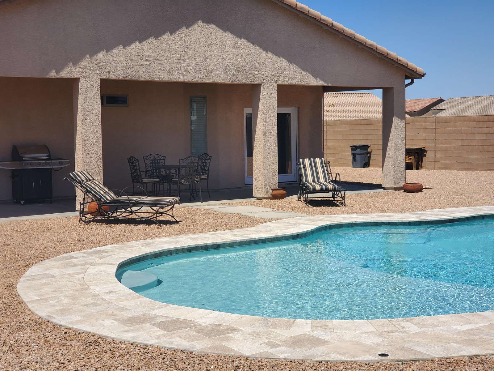 Pool with baja shelf entry.