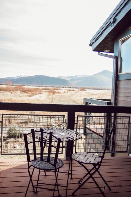 Quaint cafe table off master bedroom