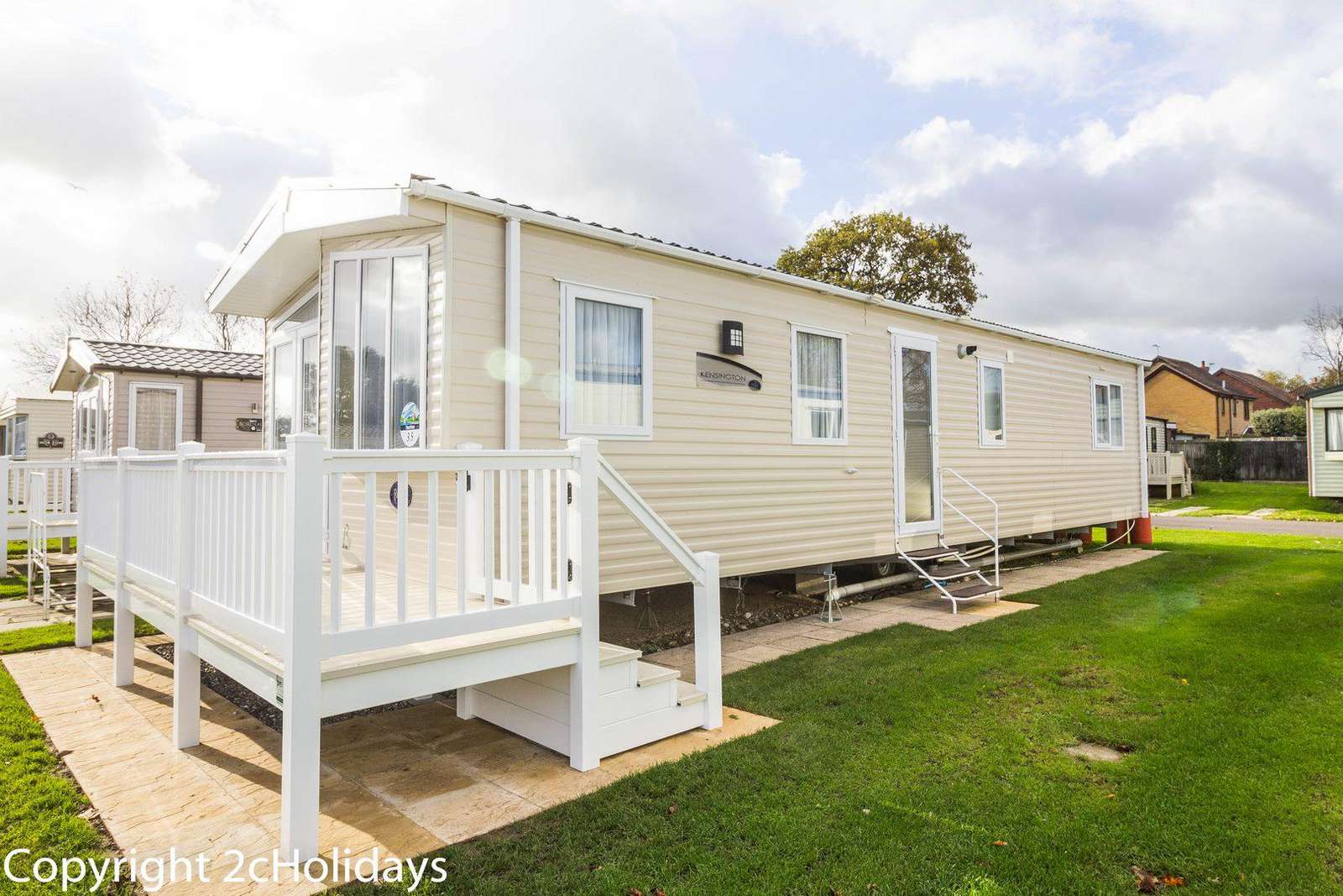 Caravan for hire with decking at Hopton Holiday Village