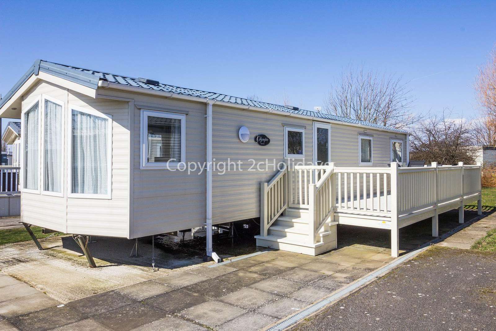 8 berth caravan with decking at Manor Park Holiday Park
