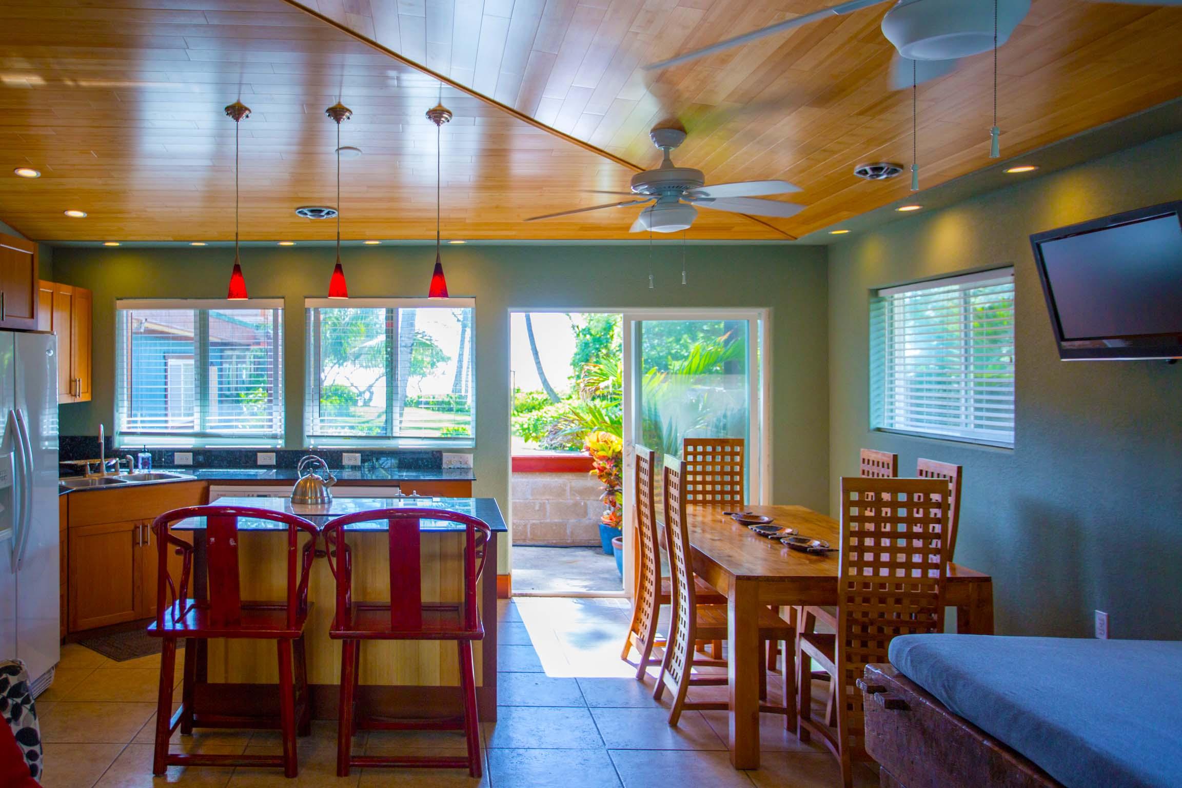 Open floor plan living and kitchen area of Bamboo Hale'
