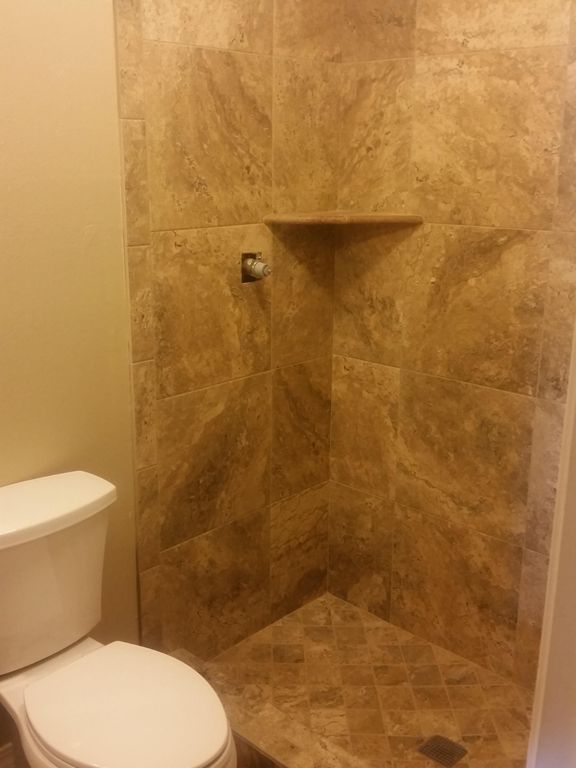 Two newly remodeled tile showers 2016.
