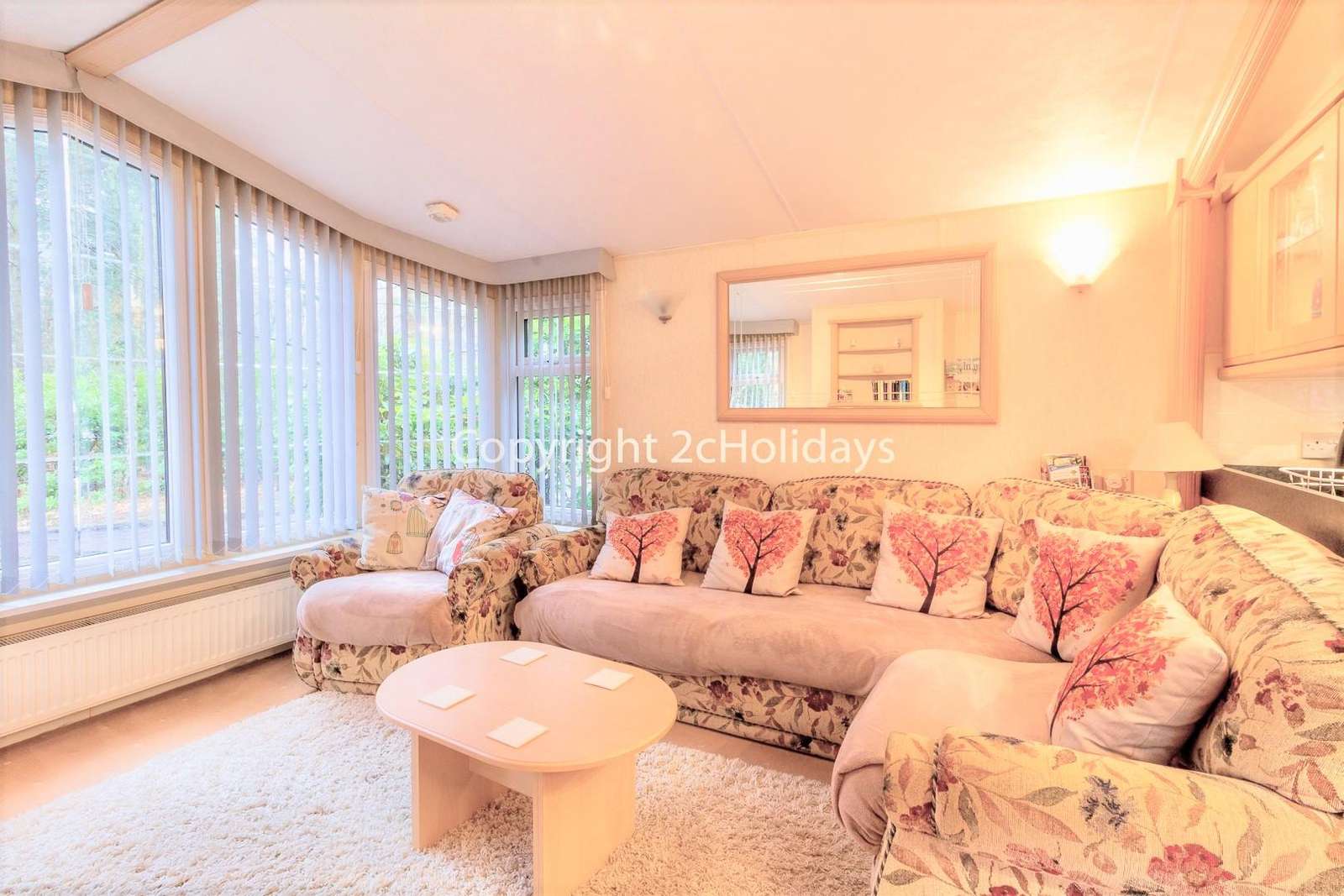 A cosy and homely living area with a TV/DVD player, ideal for families!