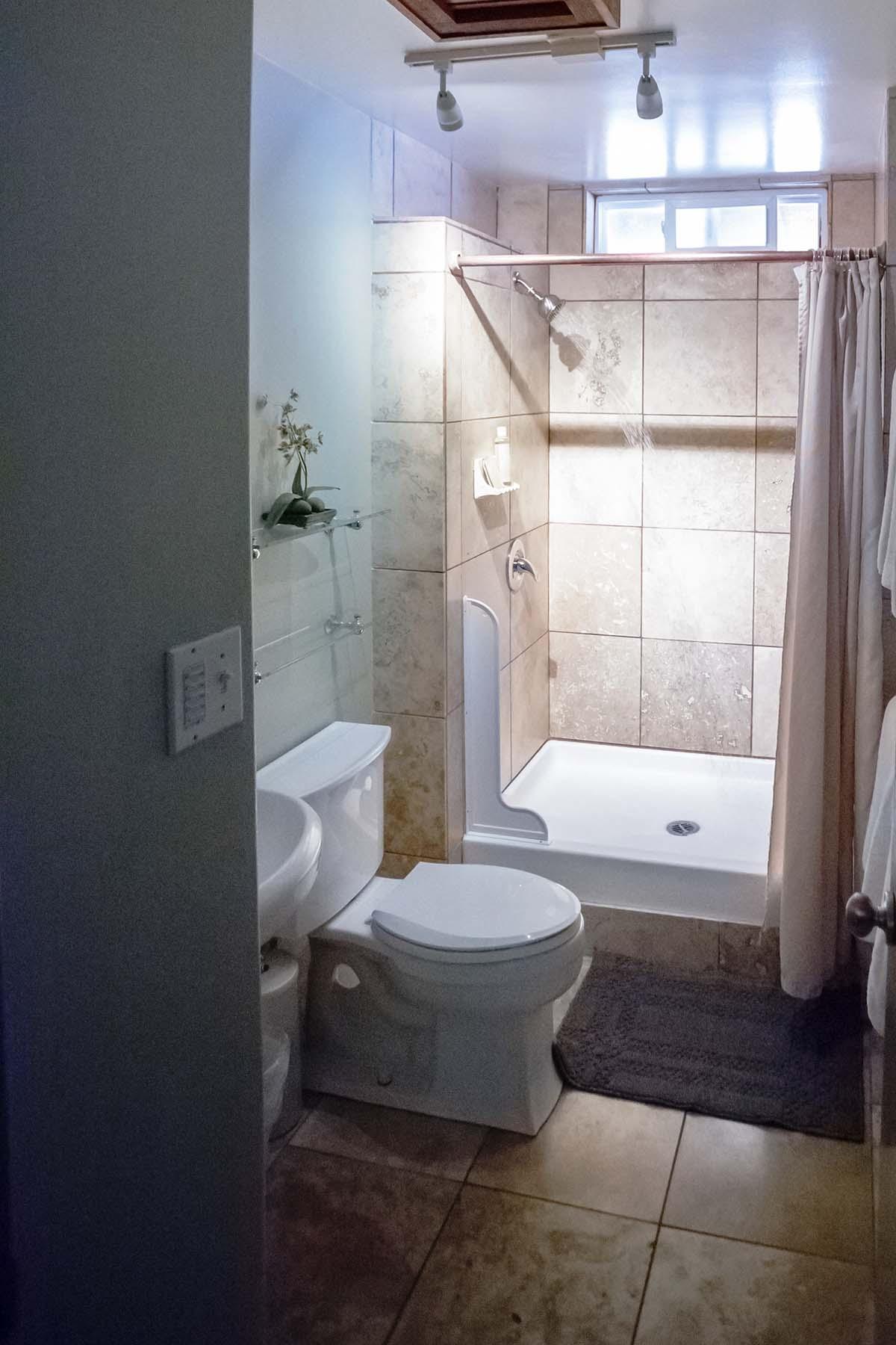 Bathroom with walk in shower.